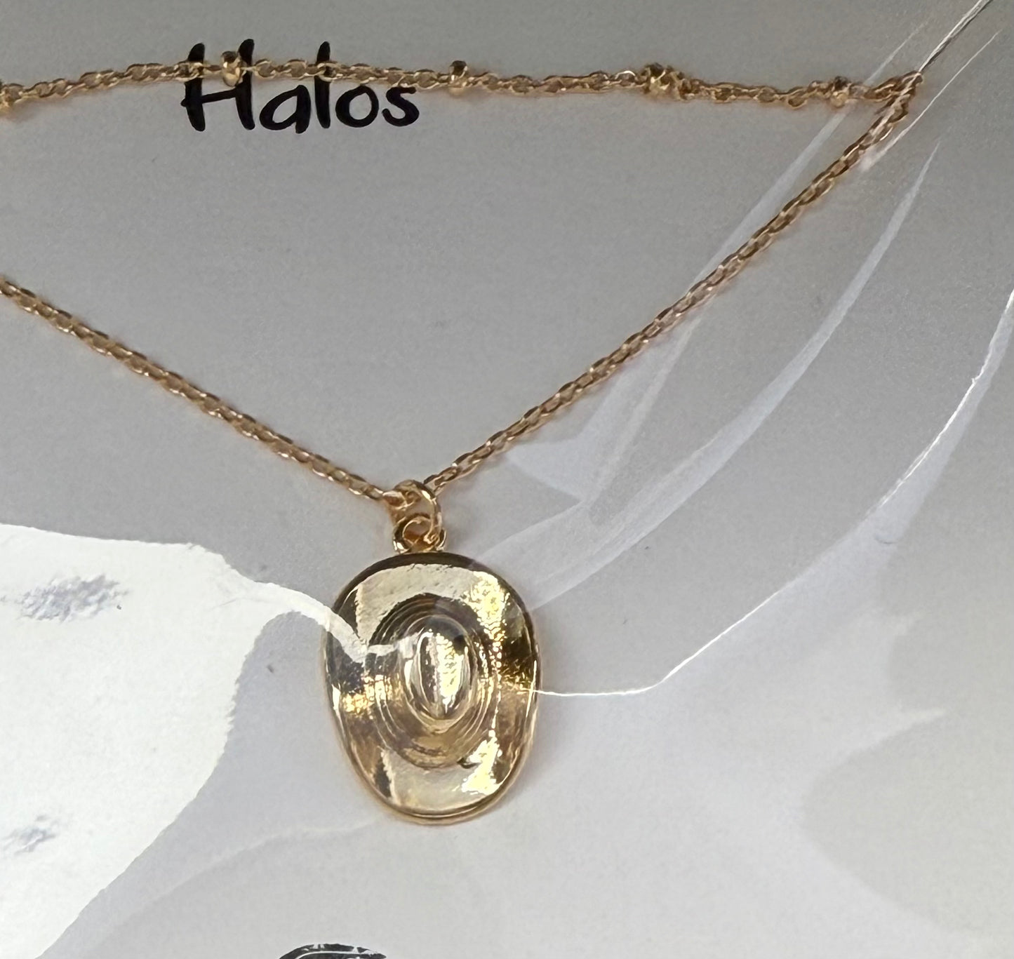 Gold cowboy hat necklace