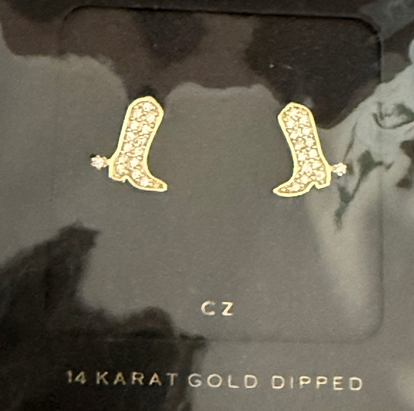 Cowboy boot and diamond stud earrings
